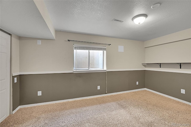 3163 E 133rd Ave, Thornton, CO 80241 - empty room with a textured ceiling and carpet