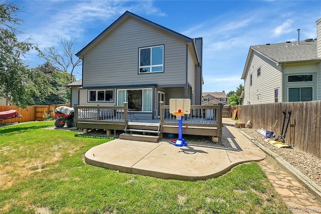 3163 E 133rd Ave, Thornton, CO 80241 - back of house featuring a fenced backyard, a deck, and a patio