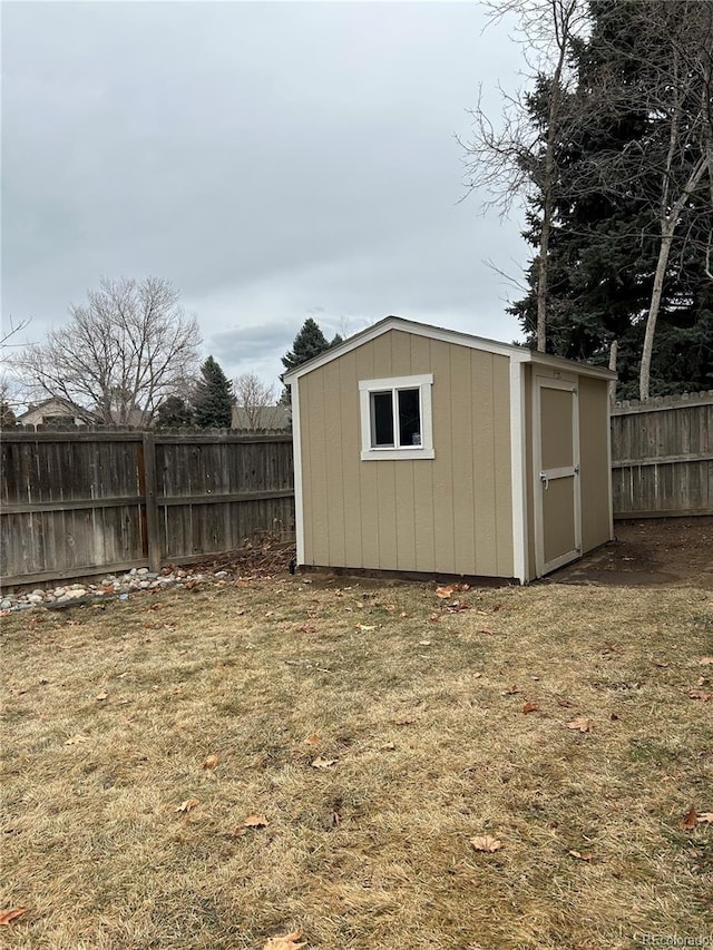 view of shed featuring a fenced backyard