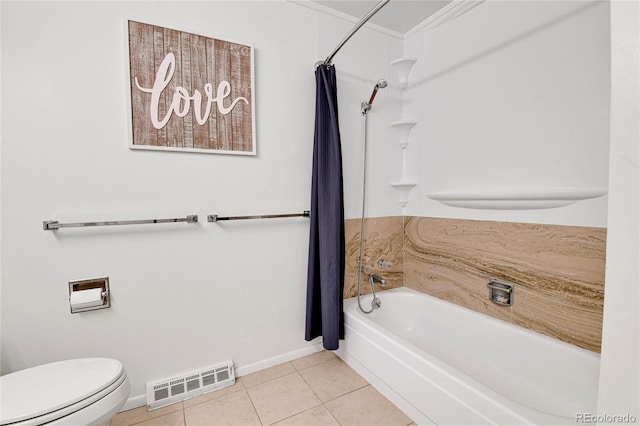 12355 E Arkansas Pl, Aurora, CO 80012 - full bathroom with shower / tub combo, baseboards, toilet, and tile patterned flooring