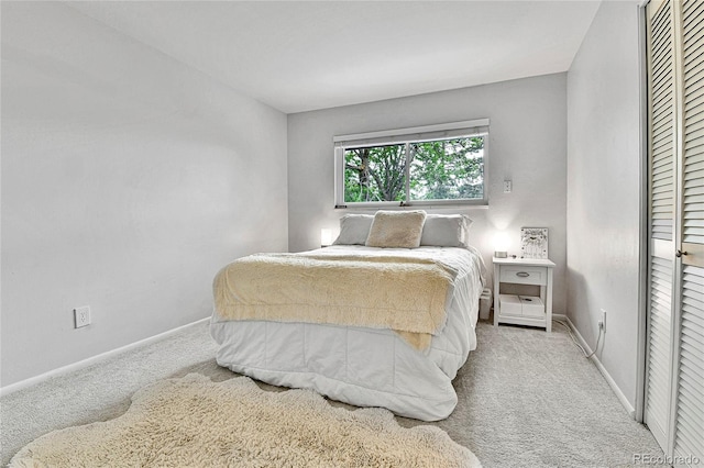12355 E Arkansas Pl, Aurora, CO 80012 - bedroom featuring light colored carpet and baseboards