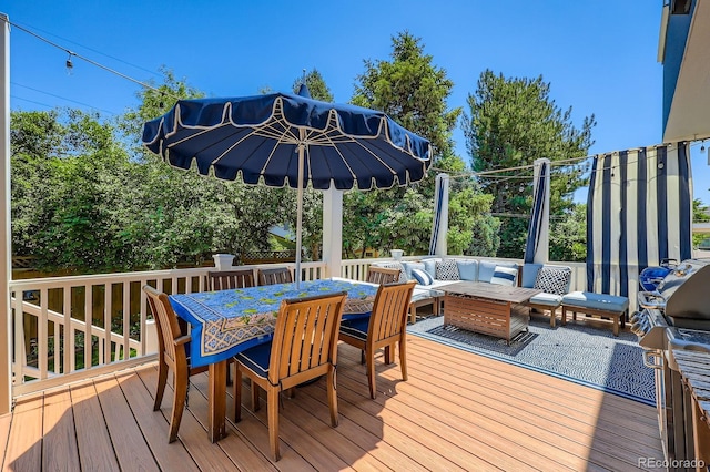 930 Kearney St, Denver, CO 80220 - wooden terrace featuring an outdoor living space, a grill, and outdoor dining area