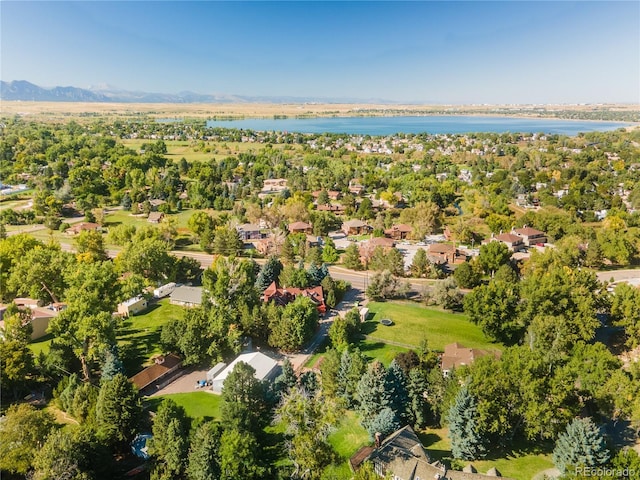 bird's eye view with a water and mountain view