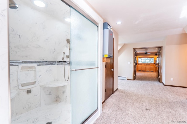 bathroom featuring a baseboard radiator, a shower, and ceiling fan