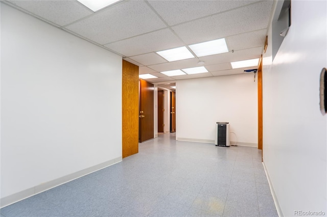 empty room with a paneled ceiling