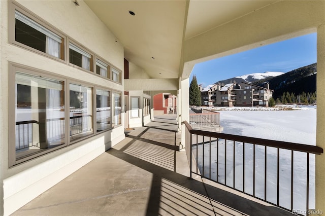 22174 US Highway 6 Unit 7, Dillon, CO 80435 - snow covered back of property with a mountain view