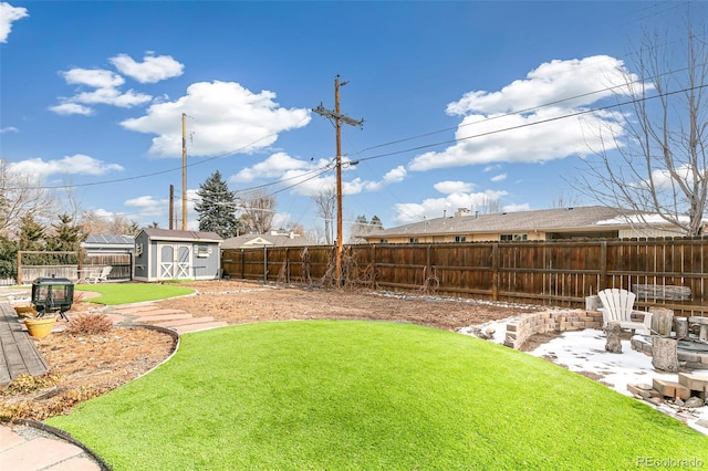 view of yard featuring a storage unit