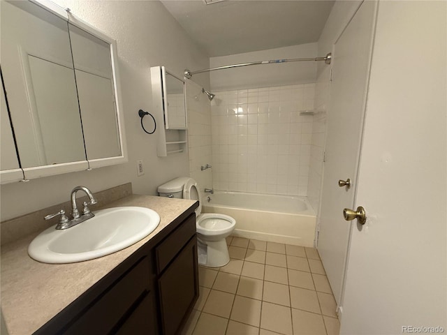 2261 S Buckley Rd Unit 102, Aurora, CO 80013 - full bath featuring vanity, toilet, tile patterned floors, and tub / shower combination