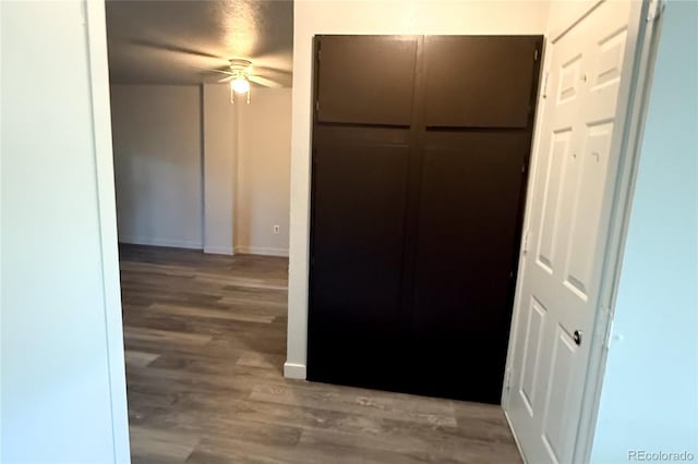 2261 S Buckley Rd Unit 102, Aurora, CO 80013 - corridor with wood finished floors and baseboards