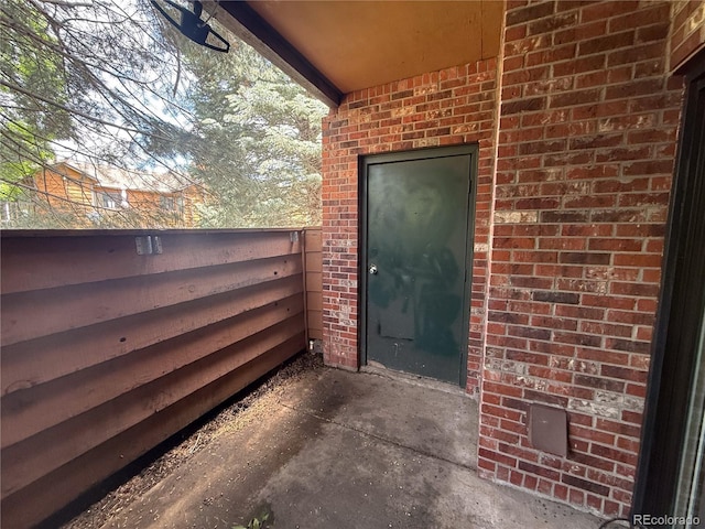 2261 S Buckley Rd Unit 102, Aurora, CO 80013 - view of exterior entry with brick siding