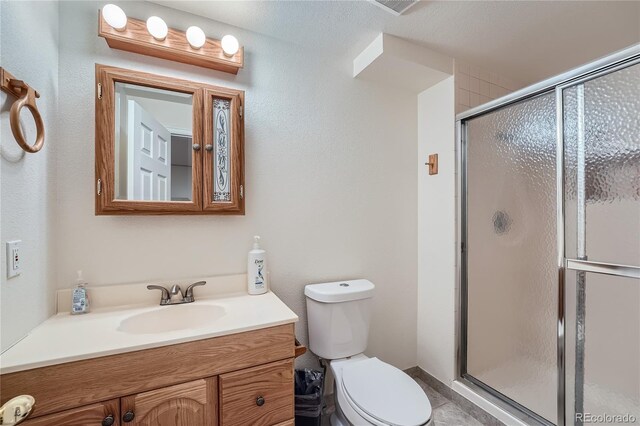 18872 E Prentice Pl, Centennial, CO 80015 - bathroom with a shower stall, toilet, and vanity