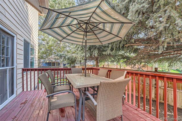 18872 E Prentice Pl, Centennial, CO 80015 - wooden deck with outdoor dining area