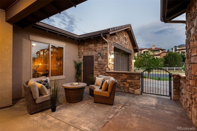 view of patio / terrace with a gate