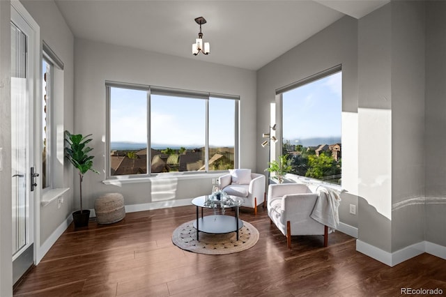 sitting room featuring wood finished floors and baseboards