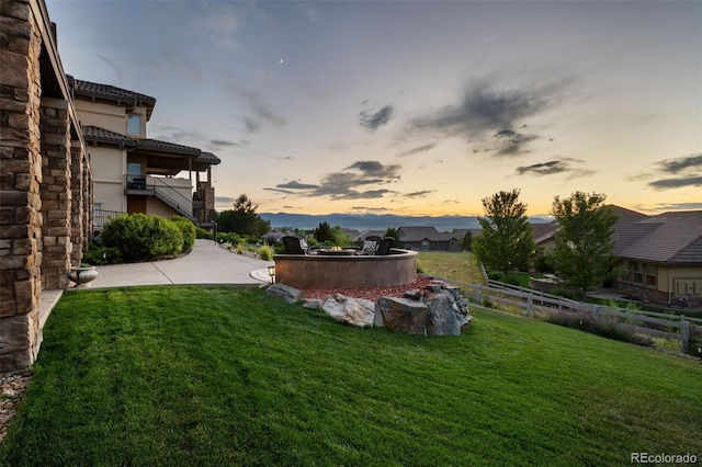 view of yard with stairway, a patio area, and fence