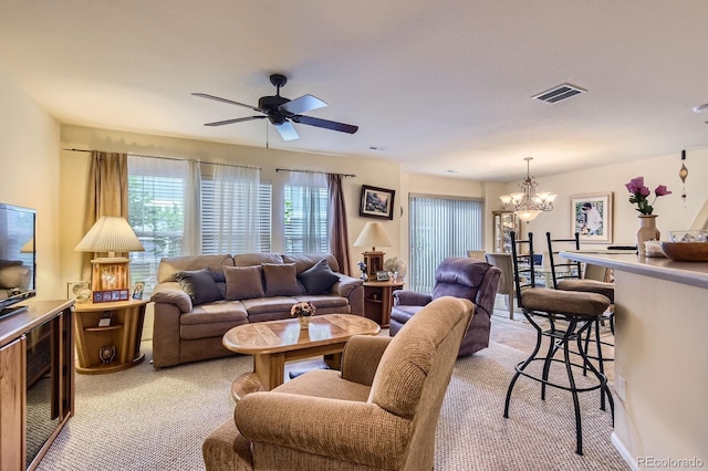 12835 Mayfair Way Unit C, Englewood, CO 80112 - living area with light colored carpet, a chandelier, and ceiling fan