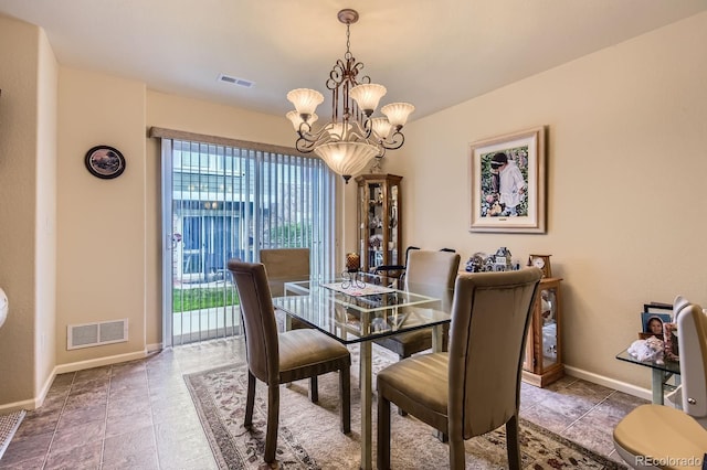 12835 Mayfair Way Unit C, Englewood, CO 80112 - dining area with a chandelier and tile patterned flooring