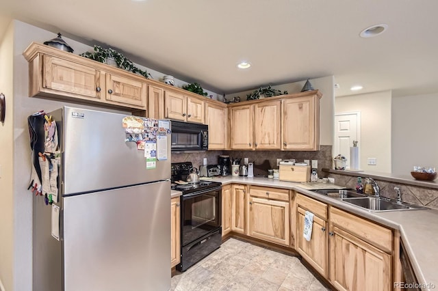 12835 Mayfair Way Unit C, Englewood, CO 80112 - kitchen featuring black appliances, light brown cabinetry, decorative backsplash, light countertops, and recessed lighting
