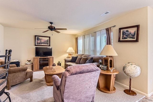12835 Mayfair Way Unit C, Englewood, CO 80112 - carpeted living area with a ceiling fan and baseboards