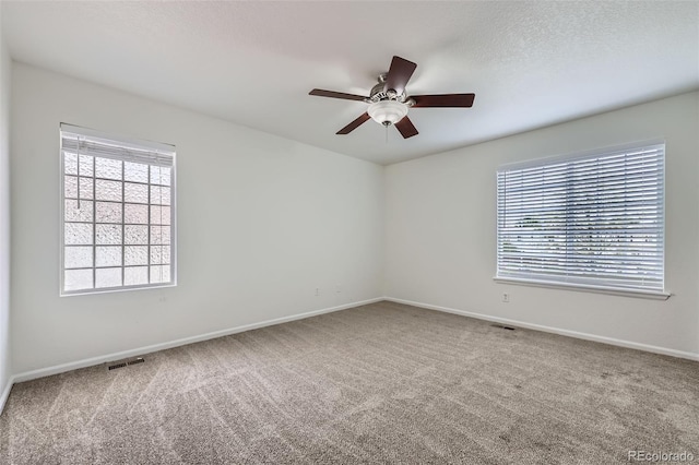 20000 E Mitchell Pl Unit 35, Denver, CO 80249 - carpeted spare room with a ceiling fan and baseboards