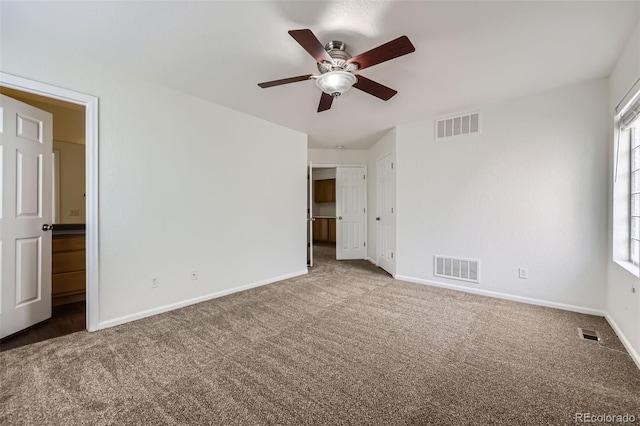 20000 E Mitchell Pl Unit 35, Denver, CO 80249 - unfurnished bedroom featuring carpet floors, baseboards, and multiple windows