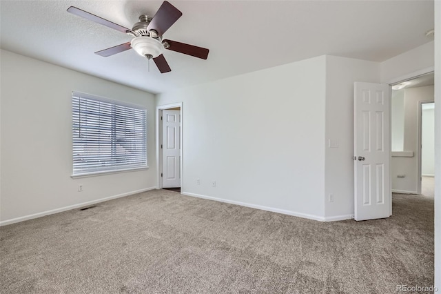 20000 E Mitchell Pl Unit 35, Denver, CO 80249 - empty room featuring carpet floors, a ceiling fan, and baseboards