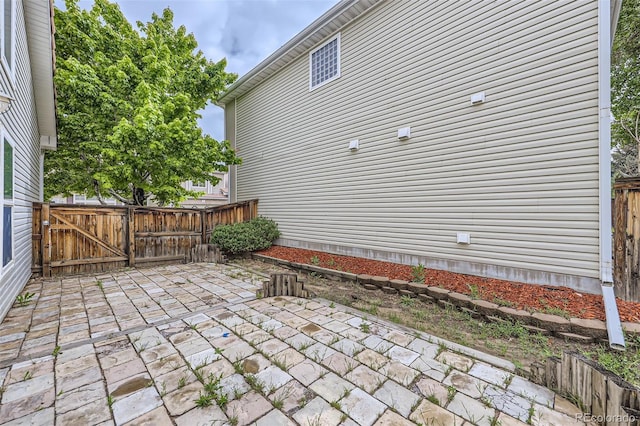 20000 E Mitchell Pl Unit 35, Denver, CO 80249 - view of patio with a gate