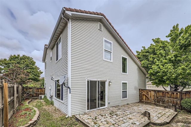 20000 E Mitchell Pl Unit 35, Denver, CO 80249 - rear view of house featuring a patio area and a fenced backyard