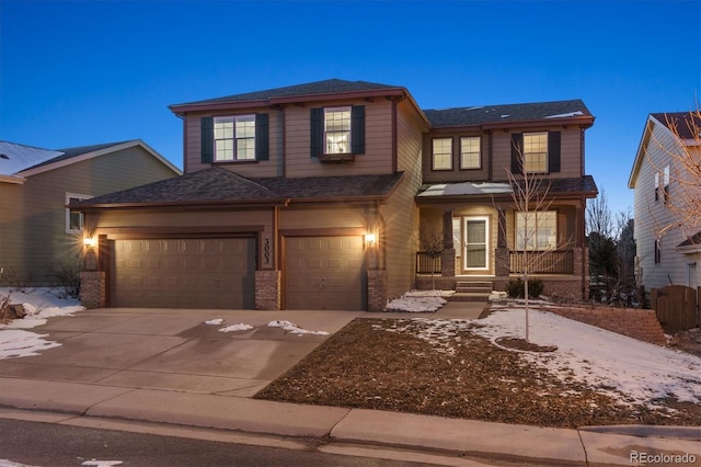 view of front of property with a garage