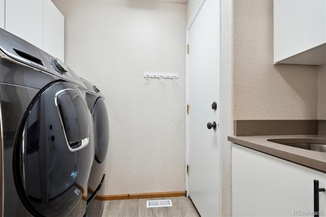 washroom with cabinets