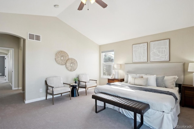 carpeted bedroom featuring vaulted ceiling and ceiling fan