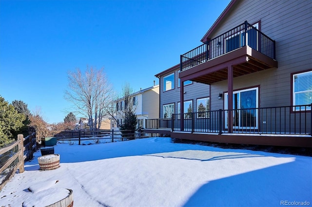 view of yard layered in snow