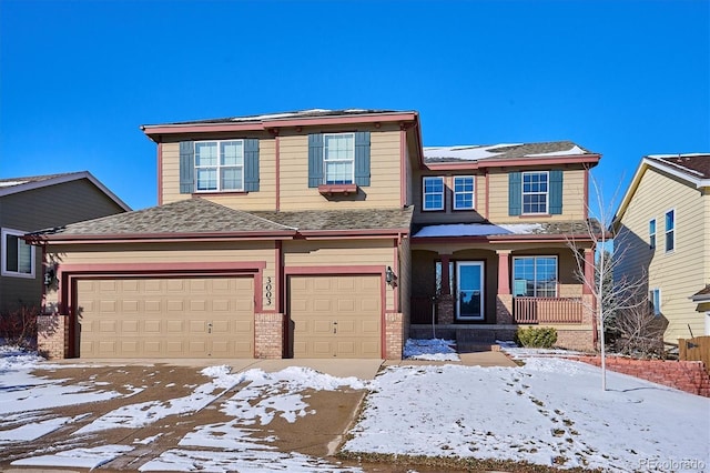 front of property with a porch and a garage