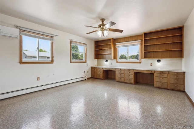 209 S 13th Ave, Brighton, CO 80601 - unfurnished office with baseboard heating, built in desk, ceiling fan, an AC wall unit, and baseboards