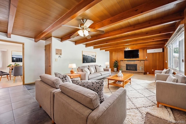 209 S 13th Ave, Brighton, CO 80601 - tiled living area with a wooden ceiling with exposed beams, a brick fireplace, and ceiling fan