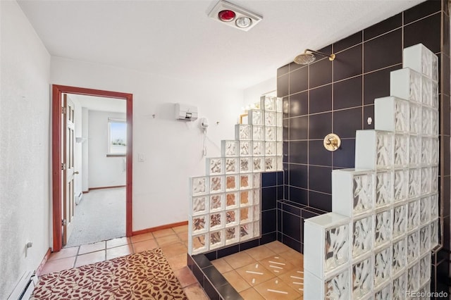 4627 Cathy Ln, Erie, CO 80516 - full bathroom featuring walk in shower, a baseboard radiator, and tile patterned floors