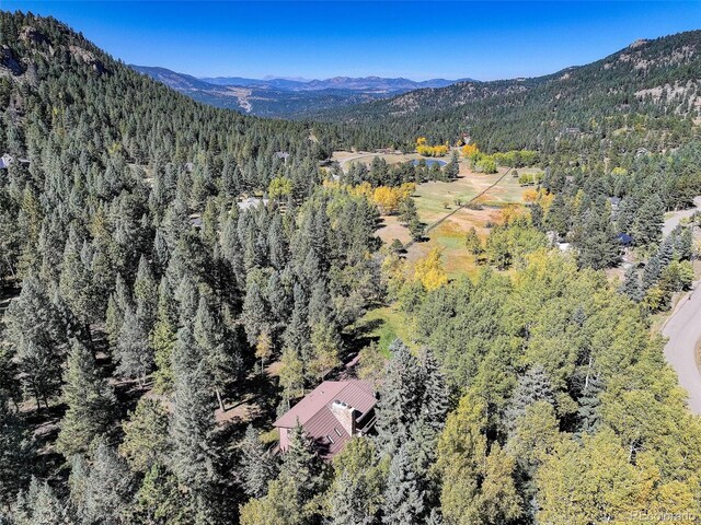 drone / aerial view featuring a mountain view