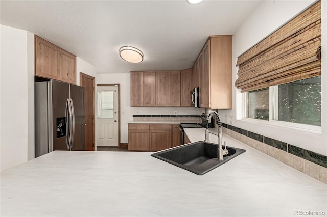 1155 Black Hawk Rd, Eaton, CO 80615 - kitchen with stainless steel appliances and light countertops