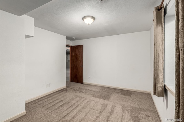 1155 Black Hawk Rd, Eaton, CO 80615 - unfurnished room featuring carpet floors and a textured ceiling
