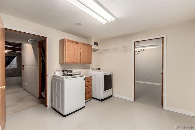 1155 Black Hawk Rd, Eaton, CO 80615 - washroom featuring cabinet space and washer and clothes dryer