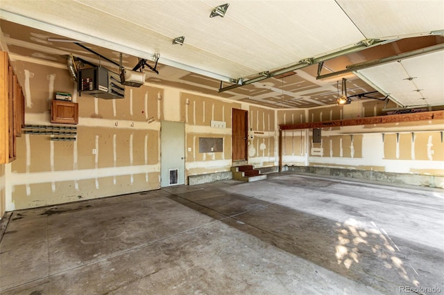 1155 Black Hawk Rd, Eaton, CO 80615 - garage featuring a garage door opener and electric panel