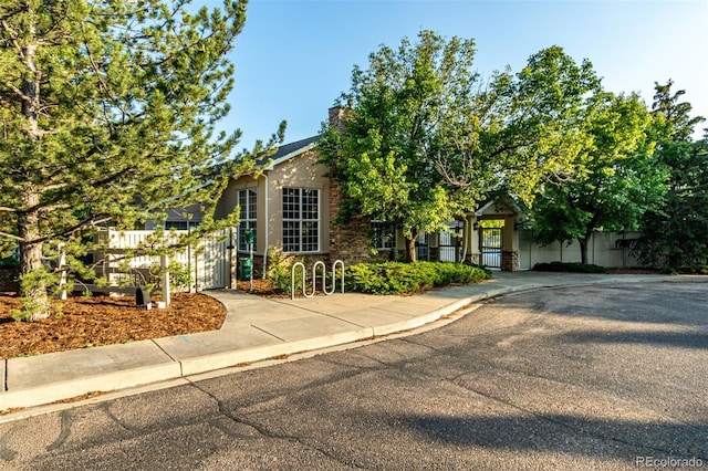 1155 Black Hawk Rd, Eaton, CO 80615 - view of property hidden behind natural elements featuring a gate