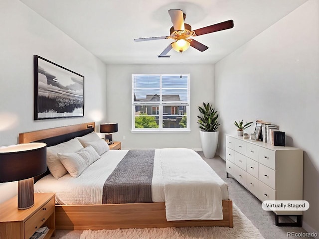 4100 Albion St Unit 523, Denver, CO 80216 - bedroom with carpet floors and a ceiling fan