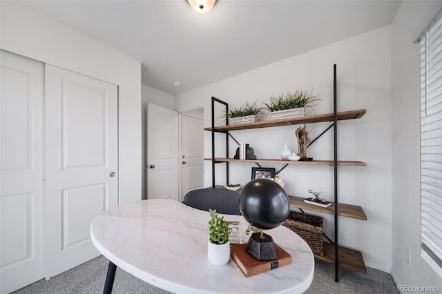 office area with baseboards and carpet floors