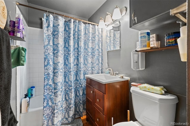 full bathroom featuring toilet, vanity, and shower / bath combo with shower curtain