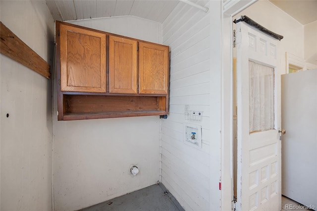 125 S Limit St, Colorado Springs, CO 80905 - laundry area with cabinet space, hookup for a washing machine, and wood walls