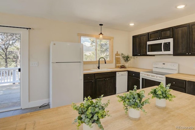 31252 County Road 384a, Buena Vista, CO 81211 - kitchen featuring white appliances, a sink, light countertops, plenty of natural light, and recessed lighting