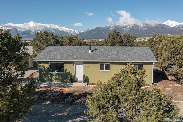 31252 County Road 384a, Buena Vista, CO 81211 - ranch-style house with a mountain view, stucco siding, and a shingled roof