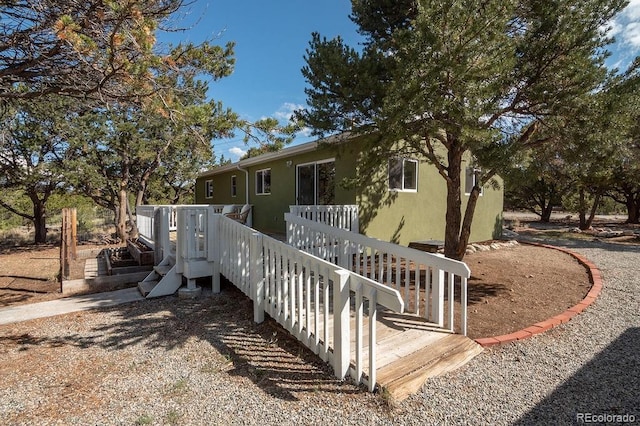 31252 County Road 384a, Buena Vista, CO 81211 - back of house with stucco siding and a wooden deck