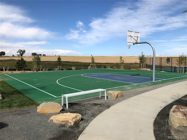 view of sport court featuring community basketball court and fence